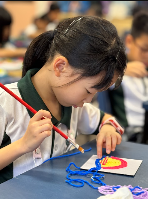 Image showing a student painting.